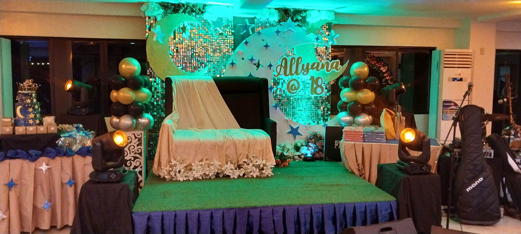 Colorful birthday party catering with balloon decor and food spread